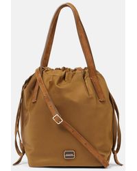 KHAITE - Rory Medium Leather-Trimmed Bucket Bag - Lyst