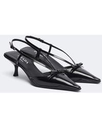 Prada - Bow-Detail Leather Slingback Pumps - Lyst