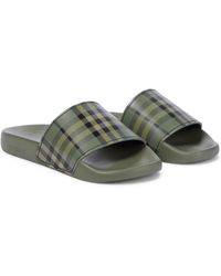 Damen Schuhe Flache Schuhe Zehentrenner und Badelatschen Burberry Gummi Pantoletten Vintage Check in Grün 