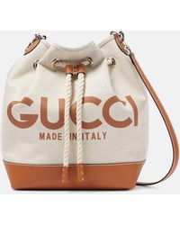 Gucci - Logo Leather-trimmed Canvas Bucket Bag - Lyst