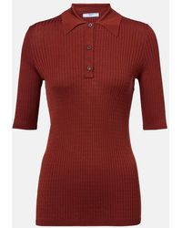 Prada - Polopullover Aus Einem Baumwollgemisch - Lyst