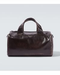 Prada - Small Leather Duffel Bag - Lyst