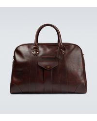 Mens Bags Gym bags and sports bags Brunello Cucinelli Logo-print Full-grain Leather Duffle Bag in Brown for Men 