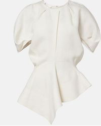 KHAITE - Rumi Peplum Linen-Blend Top - Lyst