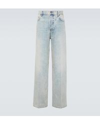 Valentino - Jeans anchos con efecto desgastado - Lyst