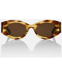Alaïa - Logo Oval Sunglasses - Lyst