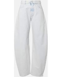 Alaïa - Low-Rise Barrel-Leg Jeans - Lyst