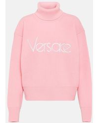 Versace - Jersey de cuello alto con logo - Lyst