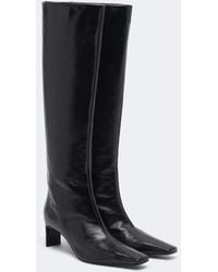 KHAITE - Ona 55 Leather Knee-High Boots - Lyst