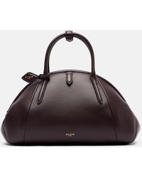 Alaïa - Purse Small Leather Top-Handle Bag - Lyst