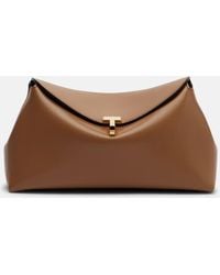 TOTEME - Clutch T-Lock Small De Piel - Lyst
