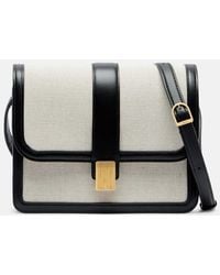 KHAITE - Blake Leather-Trimmed Canvas Crossbody Bag - Lyst