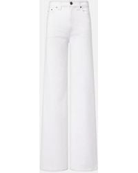 KHAITE - Dane Flared Jeans - Lyst