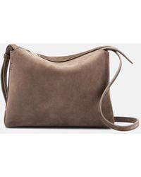 KHAITE - Lina Suede Crossbody Bag - Lyst