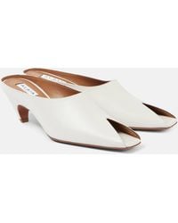 Alaïa - Spike 55 Leather Peep-Toe Mules - Lyst