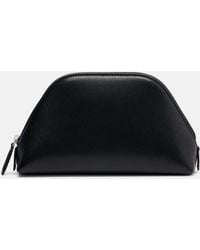 The Row - Devon Mini Leather Clutch - Lyst