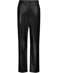 The Row Beck Leather Flared Pants in Brown (Black) | Lyst