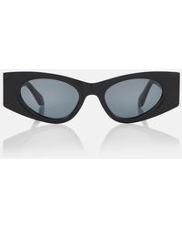 Alaïa - Logo Oval Sunglasses - Lyst