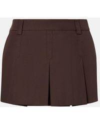 Miu Miu - Logo Cotton-Blend Miniskirt - Lyst