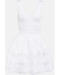 Alaïa - Alaïa Fluid Knitted Mini Dress - Lyst