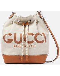 Gucci - Bolso saco de lona con ribetes de piel - Lyst