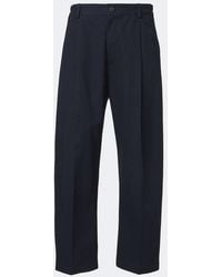 Studio Nicholson - Shire Pleated Cotton Wide-Leg Pants - Lyst