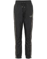PUMA Track pants and sweatpants for Women | Online Sale up to 70% off | Lyst