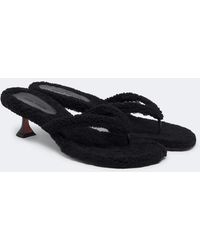 AMINA MUADDI - Juliette Shearling Thong Sandals - Lyst