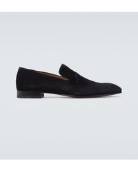 black loafers with red bottoms