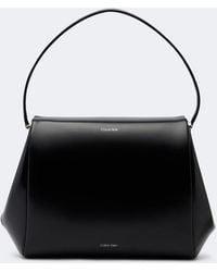 Calvin Klein - Tina Small Leather Shoulder Bag - Lyst