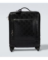 Gucci GG Embossed Small Carry-on Suitcase - Black