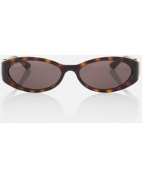 Gucci - Ovale Sonnenbrille Interlocking G - Lyst