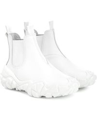 Acne Studios Botines de piel engomada - Blanco