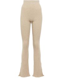 Victoria Beckham - Pantalones flared de mezcla de lana acanalados - Lyst