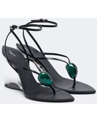 Alaïa - Invisible Leather Wedge Thong Sandals - Lyst