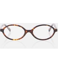 Miu Miu - Oval Glasses - Lyst
