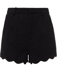 Saint Laurent Shorts de tweed en mezcla de lana - Negro