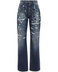 Damen Bekleidung Jeans Schlagjeans Dolce & Gabbana Ausgestellte Jeans aus Denim mit tabakbraunen Steppnähten in Blau 