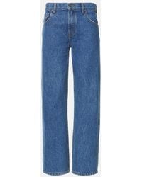 KHAITE - Kerrie Mid-Rise Wide-Leg Jeans - Lyst