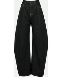 Alaïa - High-rise Barrel-leg Jeans - Lyst