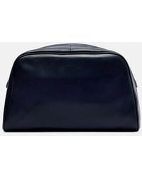 The Row - Leila Small Leather Clutch - Lyst