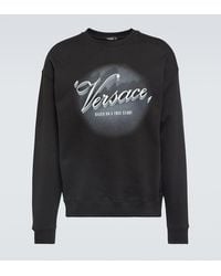 Versace - Felpa in jersey di cotone con stampa - Lyst