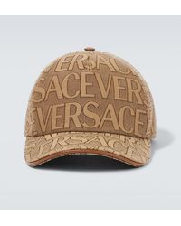 Versace - Cappello da baseball con stampa logo lettering all-over in canvas - Lyst