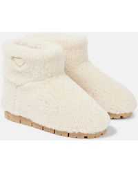 Prada - Logo Shearling Ankle Boots - Lyst
