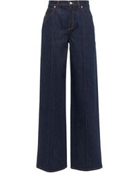 Donna Abbigliamento da Jeans da Jeans a zampa delefante Pantaloni jeansDondup in Denim di colore Viola 