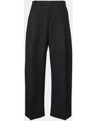 Studio Nicholson - Pull Pleated Wool Wide-Leg Pants - Lyst