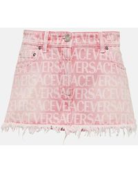 Versace - Monogram-jacquard Denim Miniskirt - Lyst