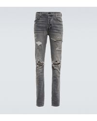 Amiri Skinny Jeans MX1 Distressed - Grau