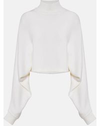 Alaïa - Cropped Linen Turtleneck Sweater - Lyst