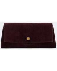 KHAITE - Audrey Suede Clutch - Lyst